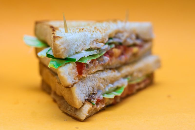 Turkey and avocado club sandwich with fresh ingredients