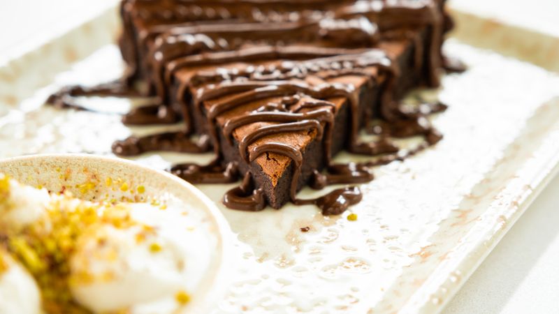 Chocolate brownie dessert with chocolate drizzle