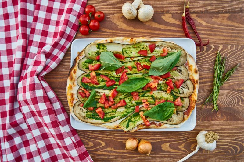 Veggie Garden pizza with fresh vegetables and herbs